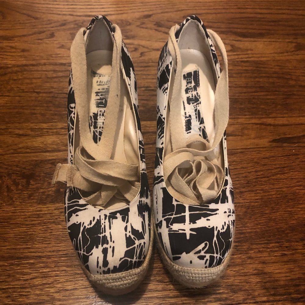 Black and white wedge shoes with ties